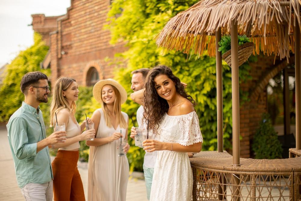 Young people having drinks in the summer